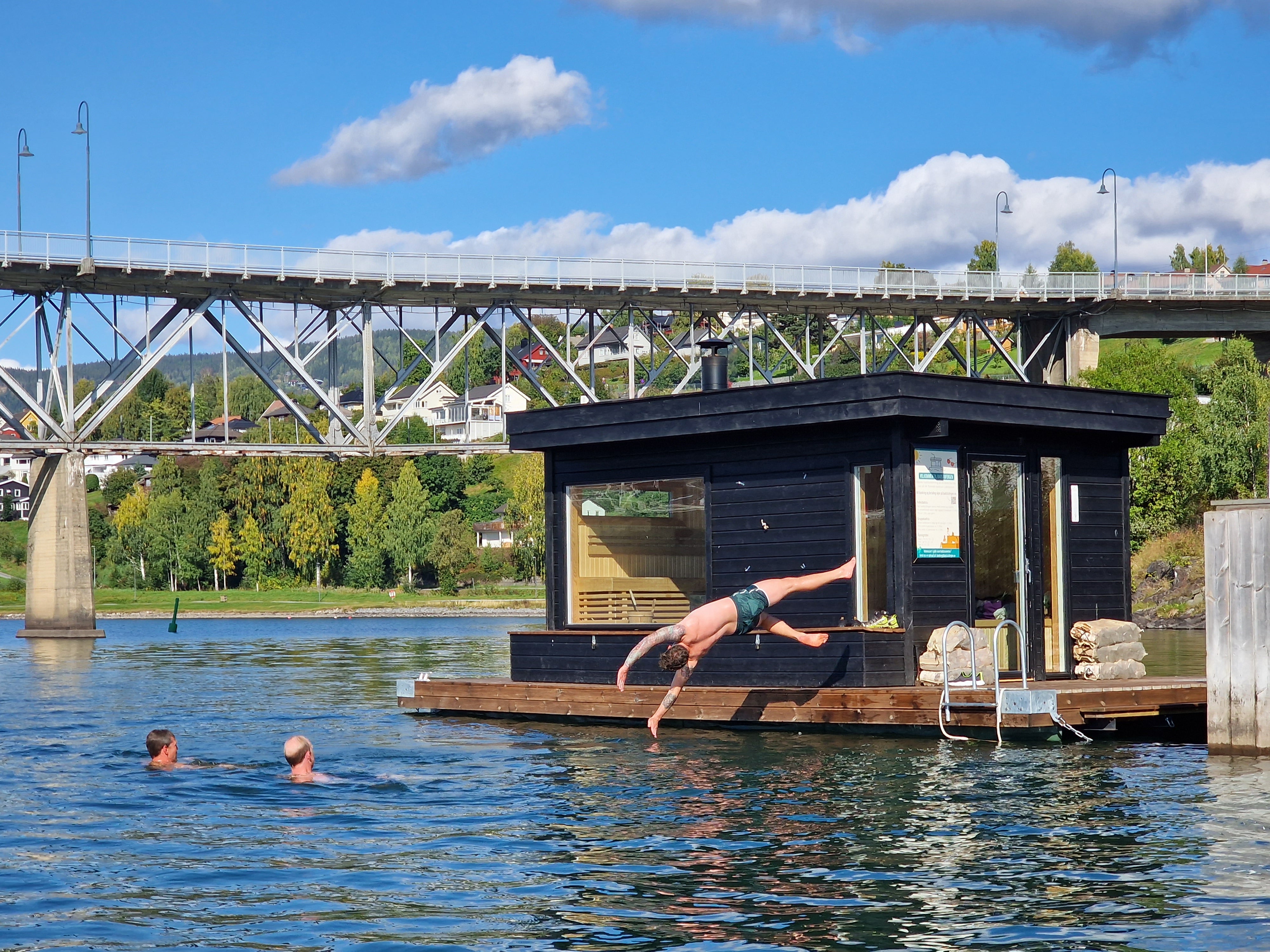 Snow-covered sauna cabin by Lake Mjøsa near Lillehammer in winter
