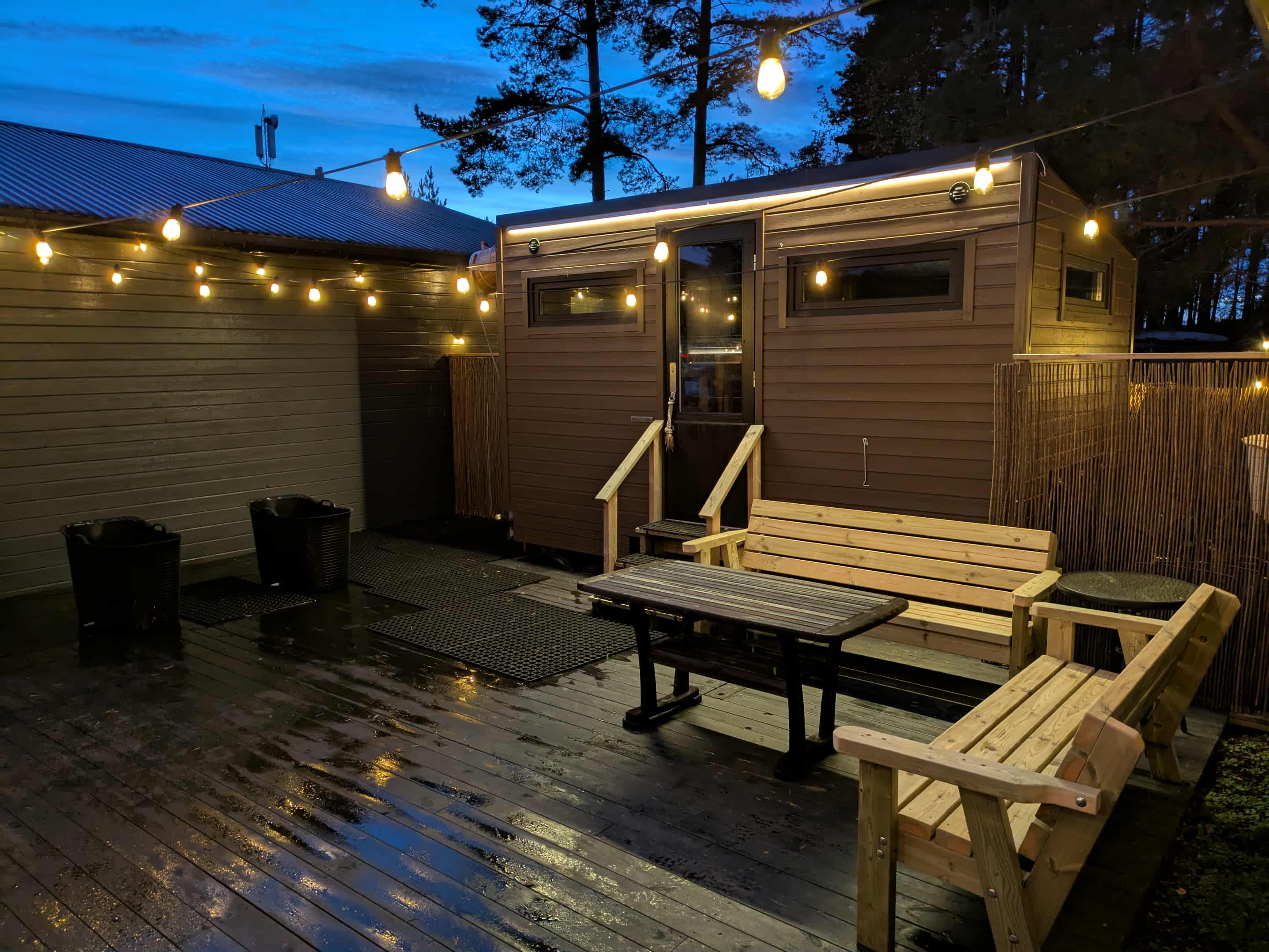 Floating sauna on the Glomma river in Fredrikstad with the Gamlebyen fortress in the distance