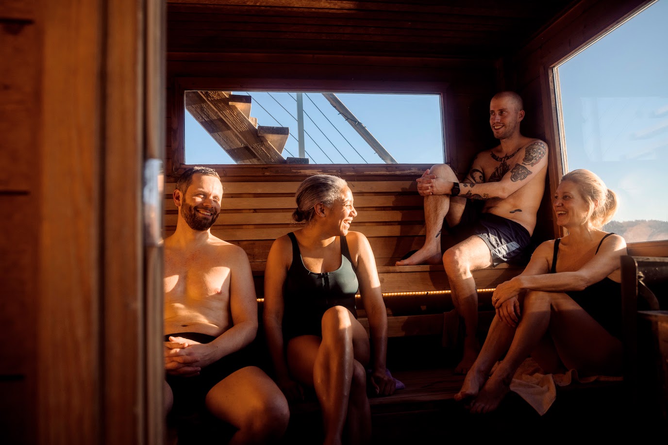 Floating sauna on the Oslofjord with Oslo city skyline in the background