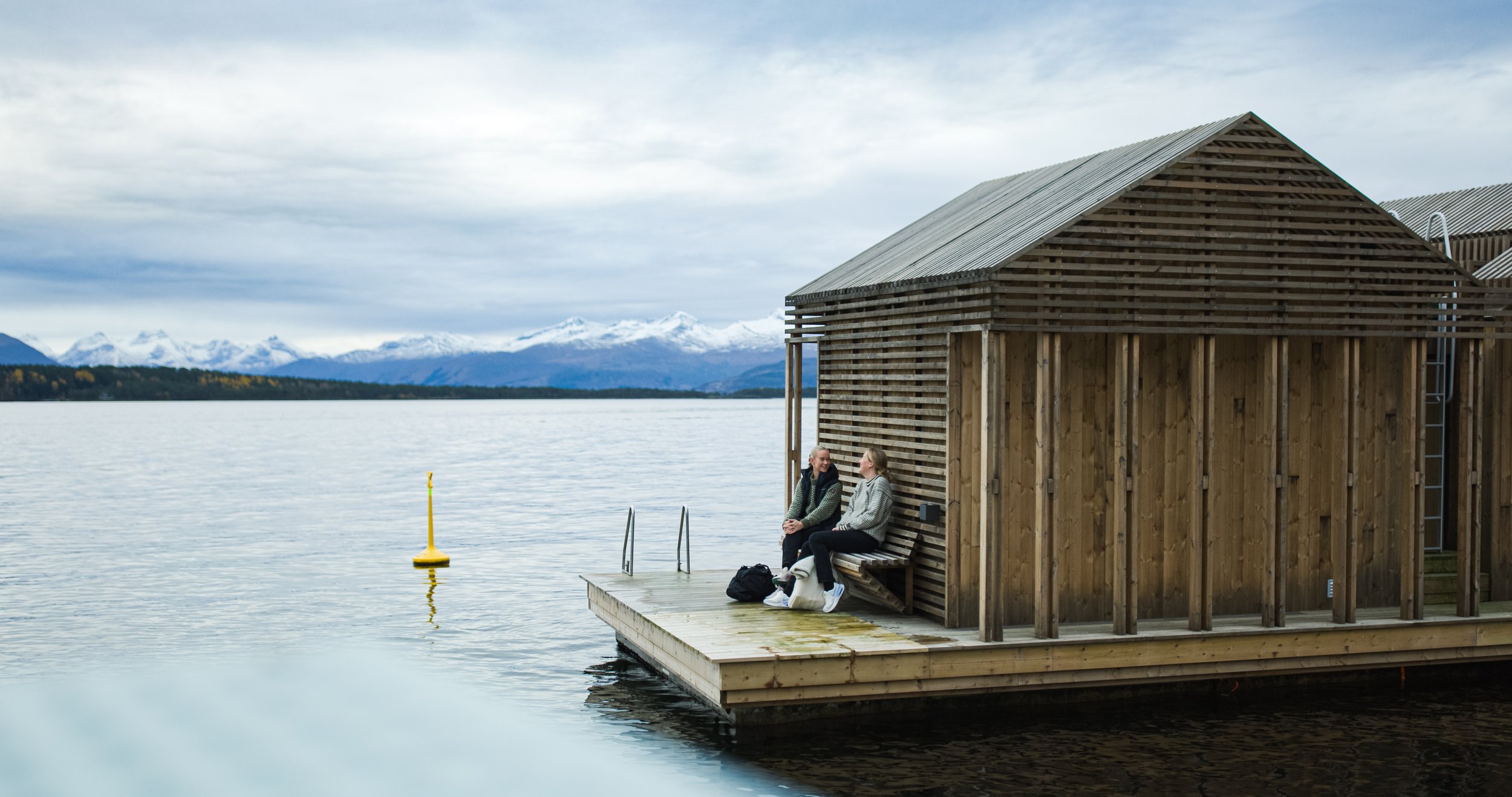 Nausta boathouse sauna on the Romsdalsfjord with the 222 peaks of Romsdal in the background
